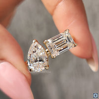 Luxurious toi et moi engagement ring with a handcrafted diamondrensu ring design.