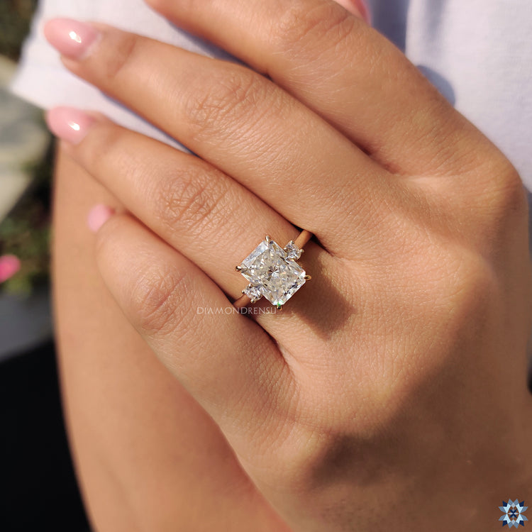 Hidden halo radiant engagement ring with flawless detailing.