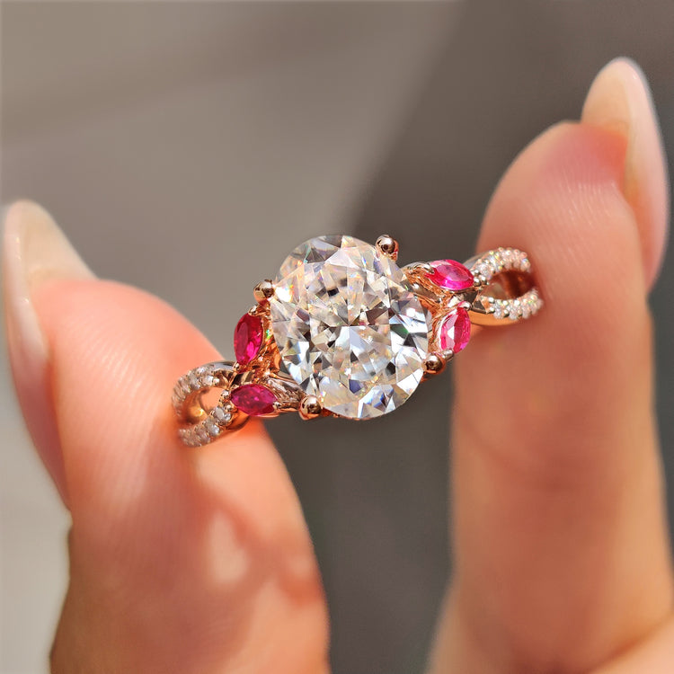 Oval moissanite engagement ring in twisted pave design.