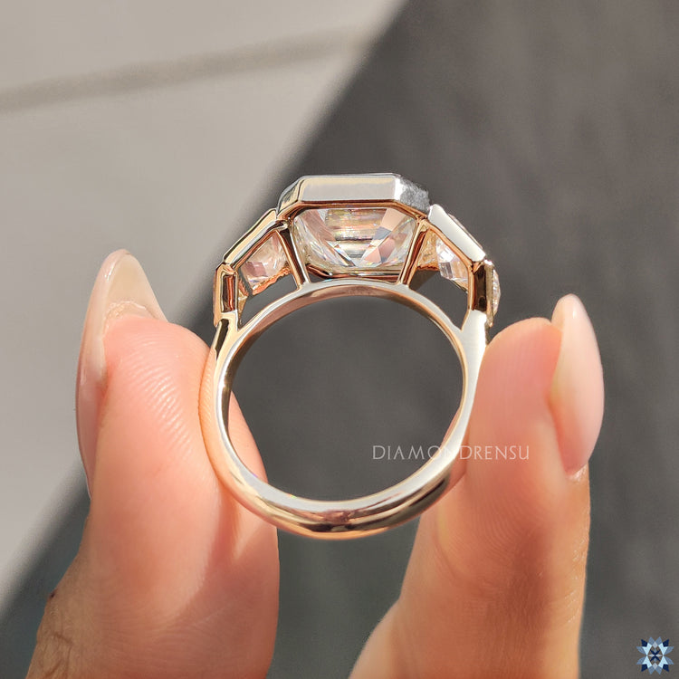 Handmade jewelry featuring an elegant asscher cut ring in white gold.