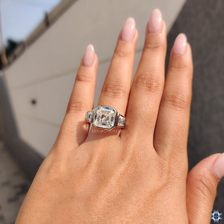Triangle ring featuring an asscher cut diamond for a bold design.