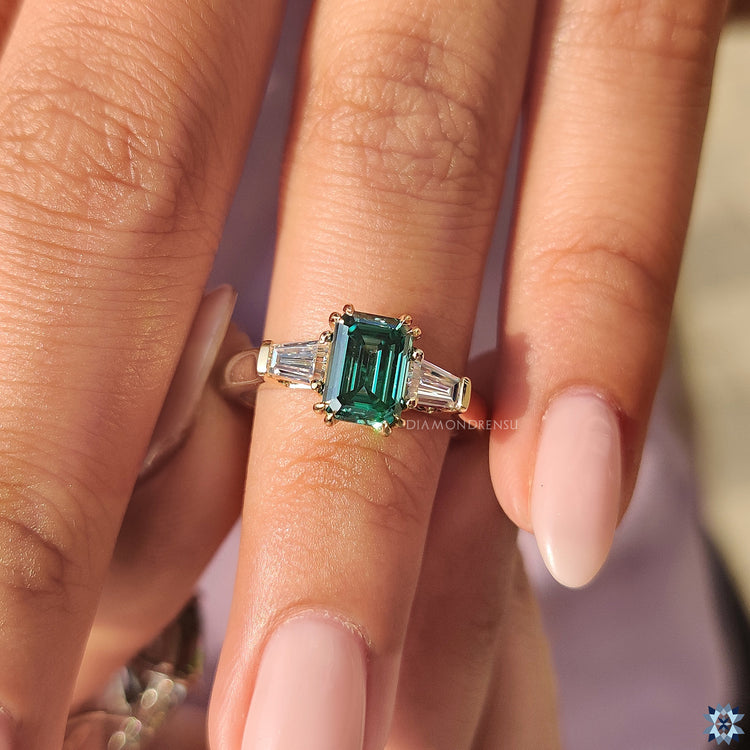 Diamondrensu Ring featuring an Emerald Cut Moissanite and 2 Tapered Baguette Side Stone.