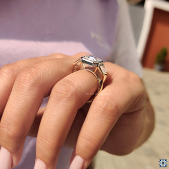 Handmade ring with an asscher cut stone for a unique, custom feel.