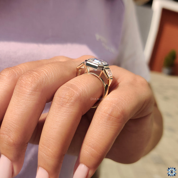 Handmade ring with an asscher cut stone for a unique, custom feel.