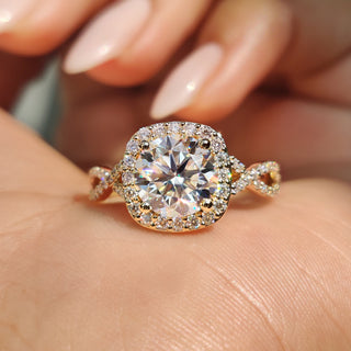 Round halo engagement ring with delicate moissanite accents