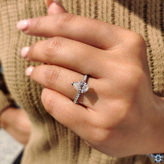 Pave Setting Ring featuring round cut moissanite diamonds.