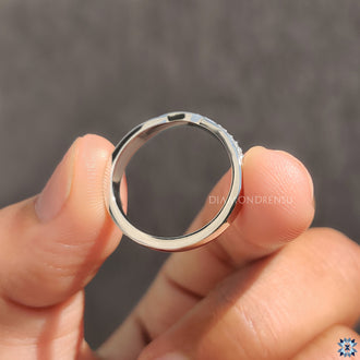 Custom wedding band with baguette and round cut stones.