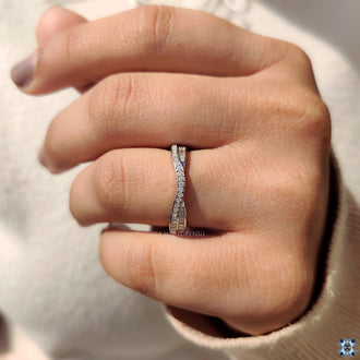 Handmade wedding band with moissanite baguette stones.