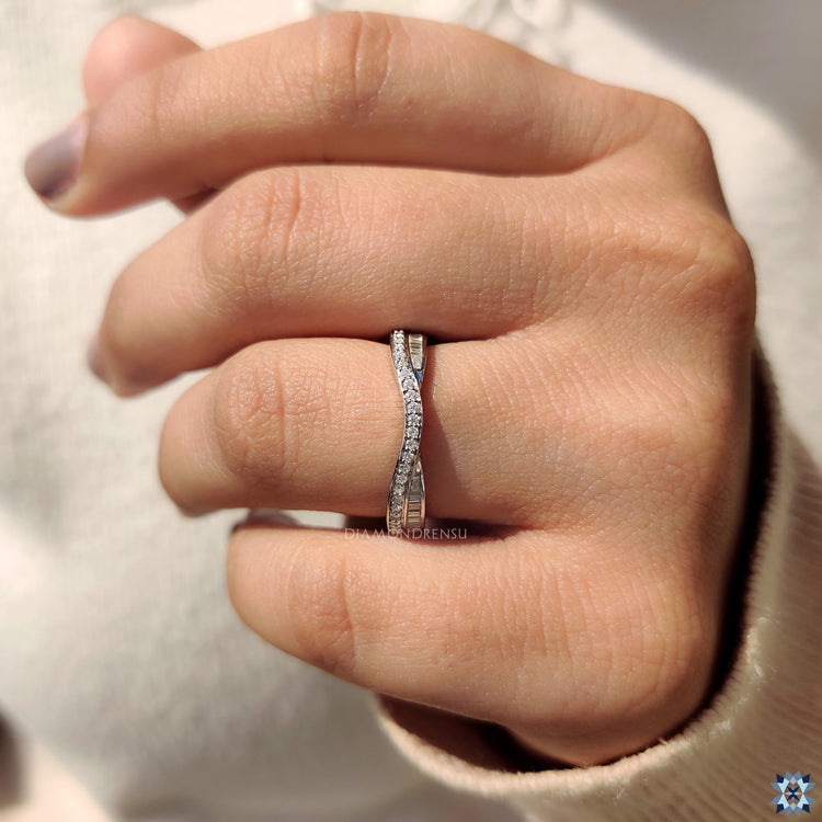 Handmade wedding band with moissanite baguette stones.