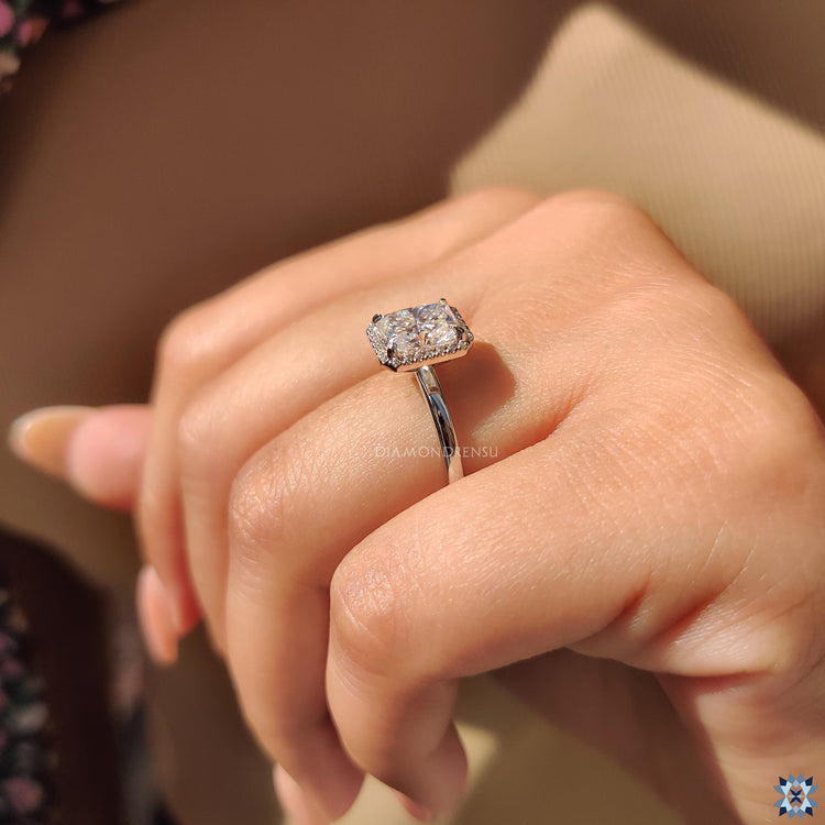 Stunning white gold engagement ring with a moissanite centerpiece.