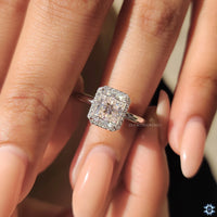 4 prong claw setting securing a dazzling moissanite stone.