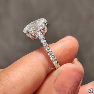 Prong setting ring showcasing moissanite brilliance.