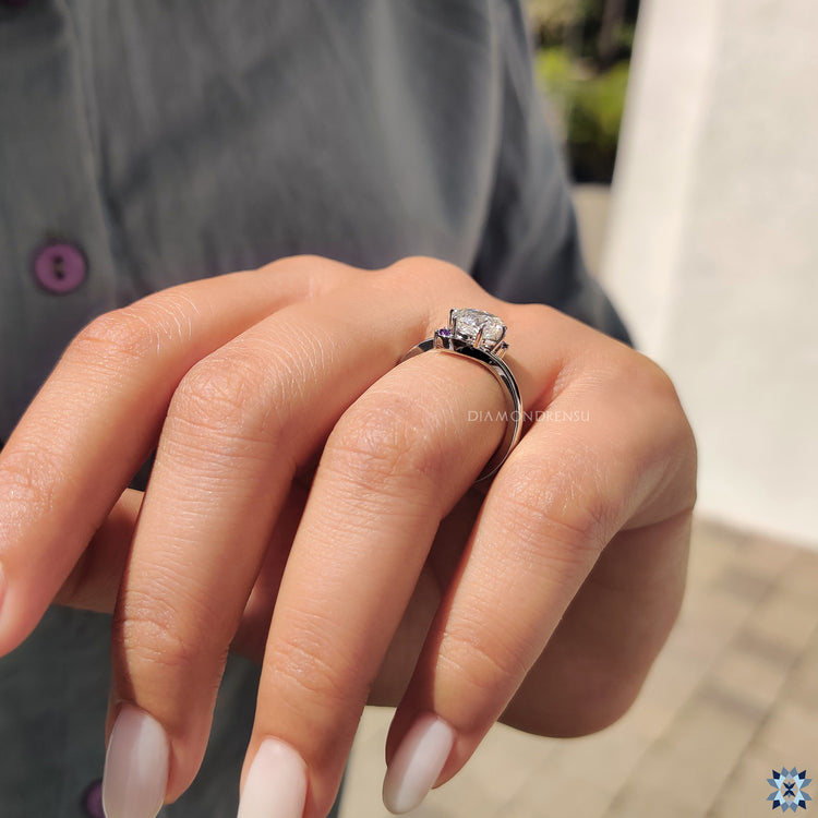 Six-prong ring holding the moissanite securely.