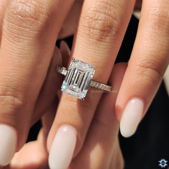 Diamondrensu engagement ring presented with a rose.