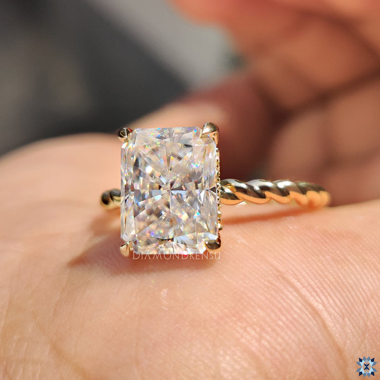 Custom engagement ring using moissanite center.