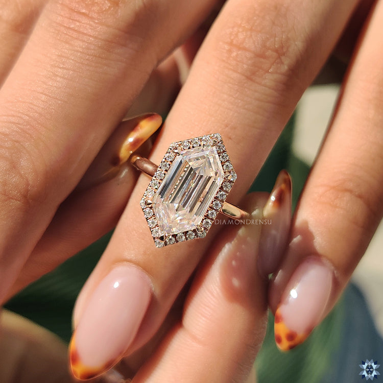 Diamondrensu engagement ring with halo setting.