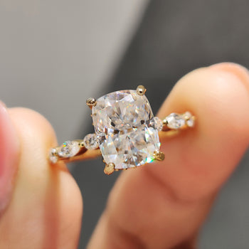 Cushion cut moissanite ring with a bright center stone.