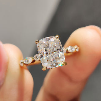 Cushion cut moissanite ring with a bright center stone.