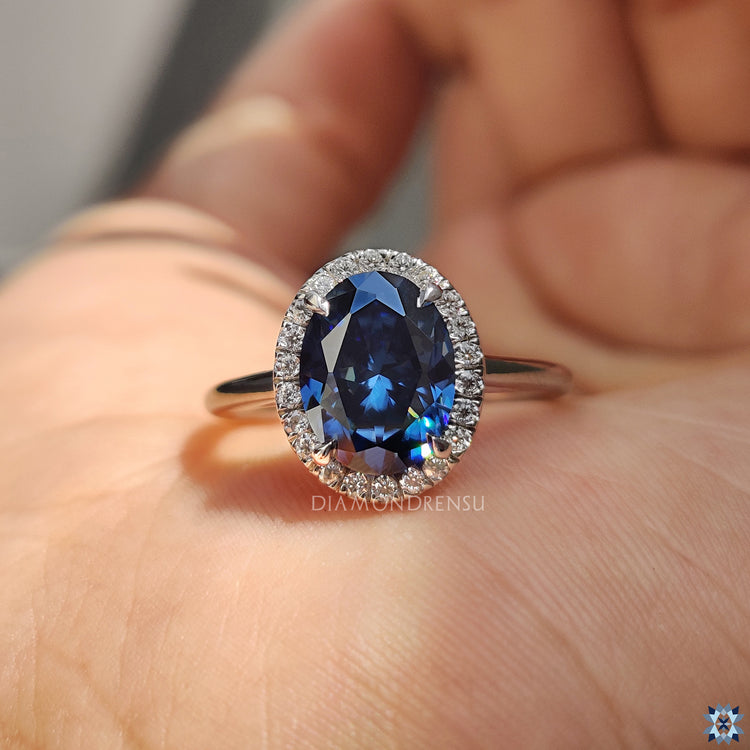 This blue oval engagement ring offers a unique, bold design.