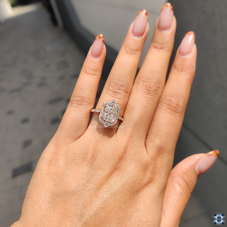 Art Deco engagement ring with a stunning halo setting.