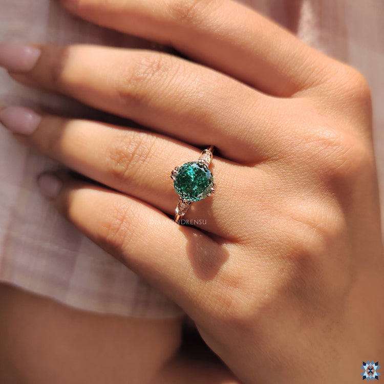 7 diamond moissanite stones lined in a rose gold setting.