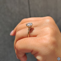Round cut moissanite ring, a beautiful and affordable alternative to diamonds, designed to shine with brilliance.