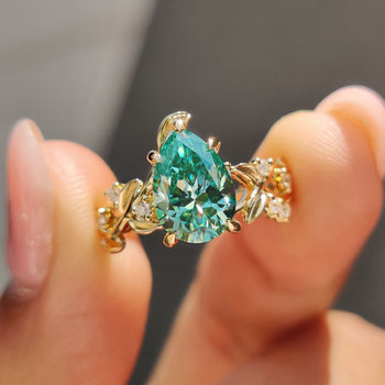 Pear cut engagement ring, featuring a stunning moissanite stone with a unique, elegant design.