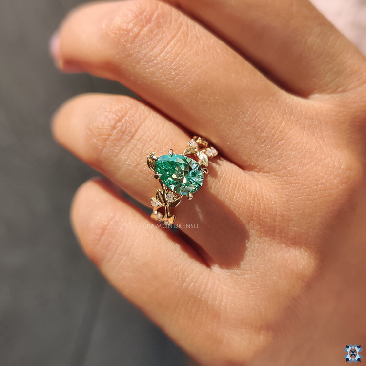 Green moissanite ring, showcasing the beauty of nature with a stunning green hue and sparkling shine.