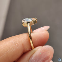 5 prong engagement ring showcasing a brilliant moissanite stone.