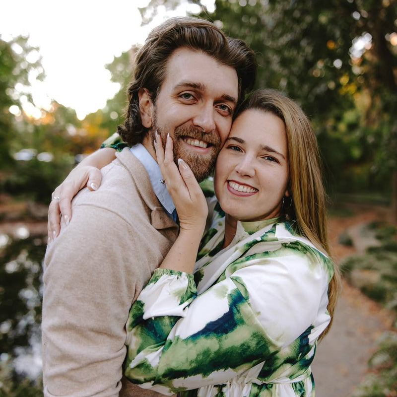 Man and woman smiling together for an outdoor portrait Man and woman smiling together for an outdoor portrait