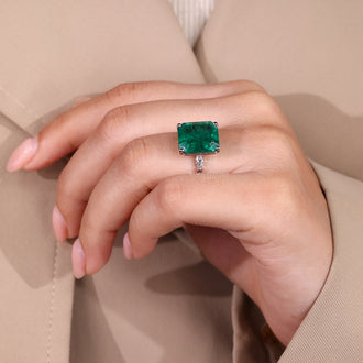Handmade emerald gemstone engagement ring.