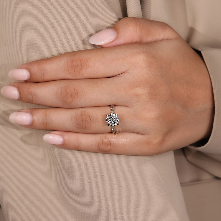 Handmade jewelry featuring a round diamond ring.