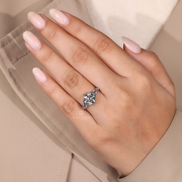 Diamondrensu engagement ring with five stone design.