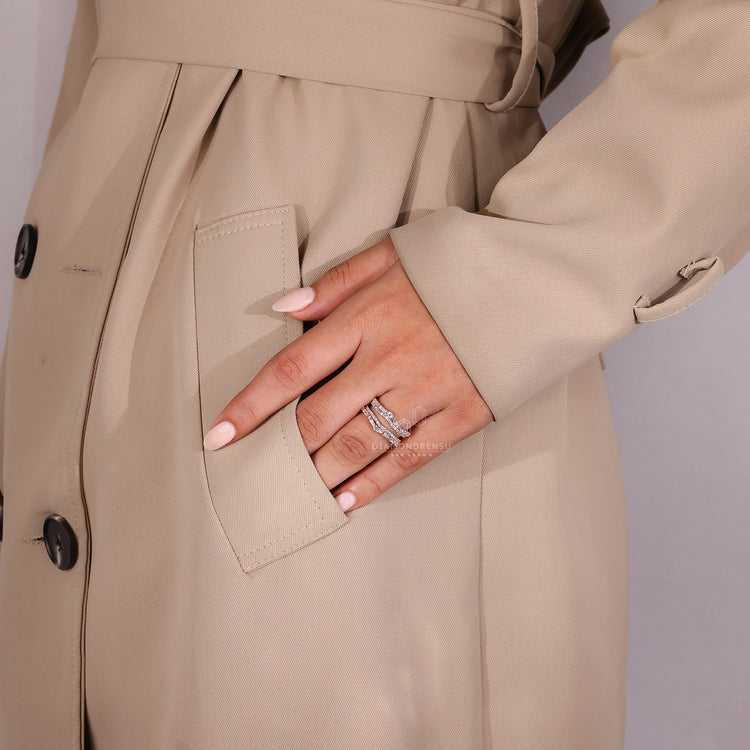 Diamondresnu Wedding Band crafted in rose gold with a double row setting.