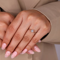 Lab grown diamond ring with elegant six claw prong setting.