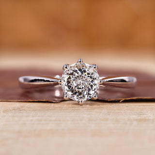 Portuguese cut diamond engagement ring with clean lines and fine detailing.
