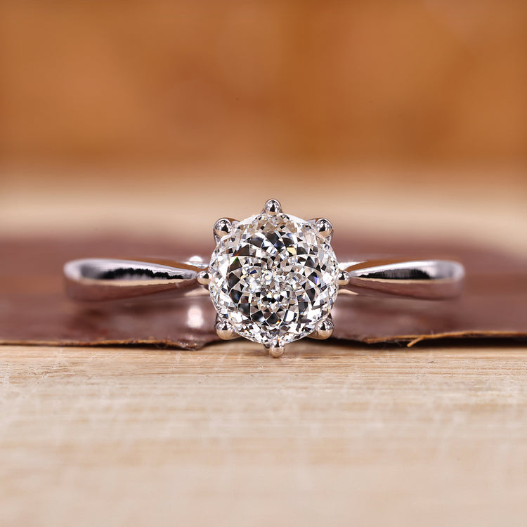 Portuguese cut diamond engagement ring with clean lines and fine detailing.