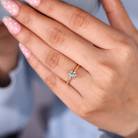 IGI certified solitaire ring with cathedral setting.