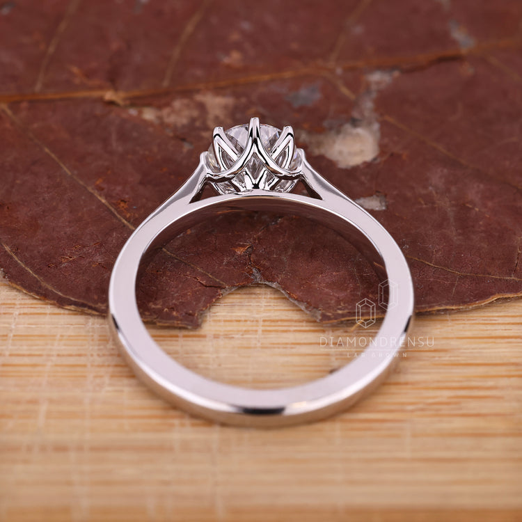 Handmade jewelry showcasing a unique eight prong setting and smooth finish.