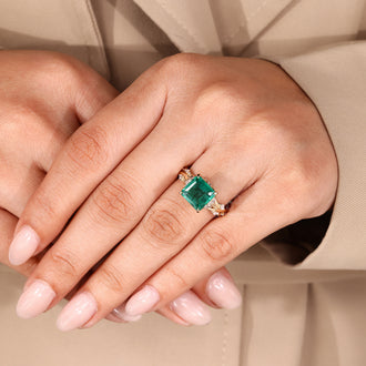 Handmade emerald gemstone engagement ring.