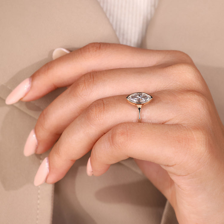 Buy lab grown ring with a marquise cut diamond look.
