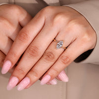 Lab grown diamond ring in compass prong and bypass design.