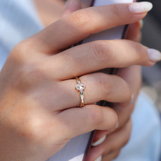 6 claw prong setting securing the center stone with strength and style.