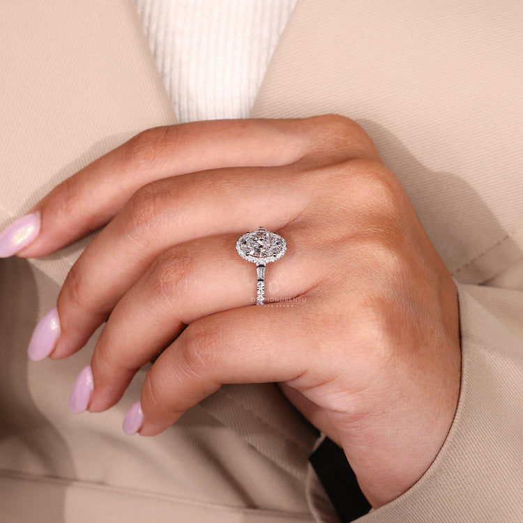 White gold engagement ring featuring a prong setting ring.