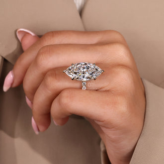 Six claw prong marquise diamond ring.