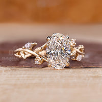 Diamondrensu engagement ring with oval cluster and side stones