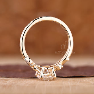 Buy engagement ring with oval diamond and floral side stone design