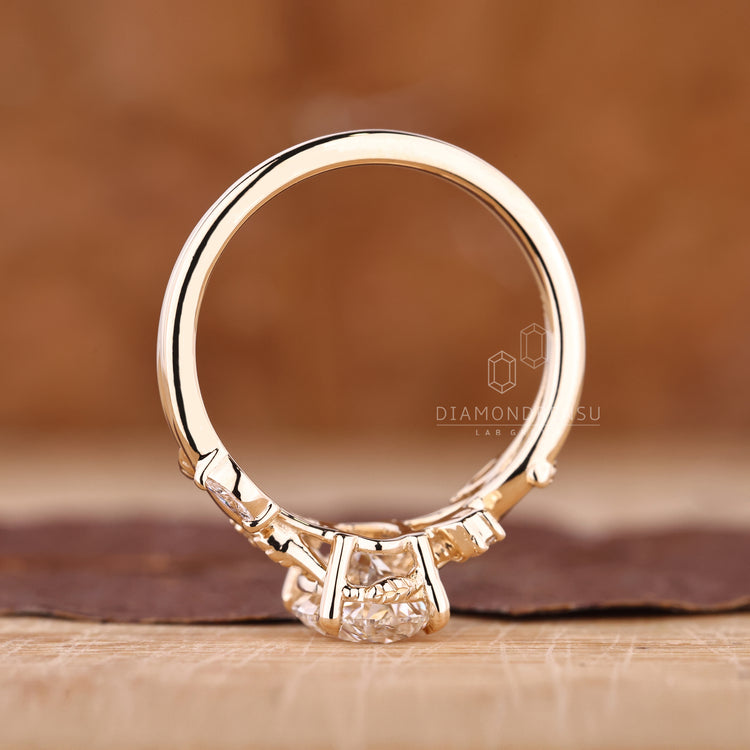 Buy engagement ring with oval diamond and floral side stone design