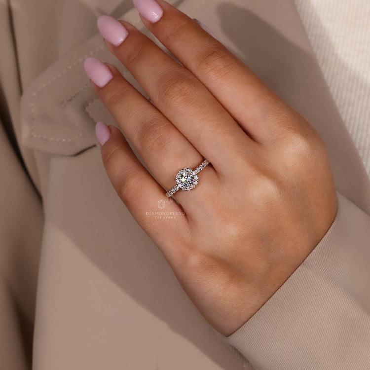 Handmade jewelry ring with halo and pave accents.