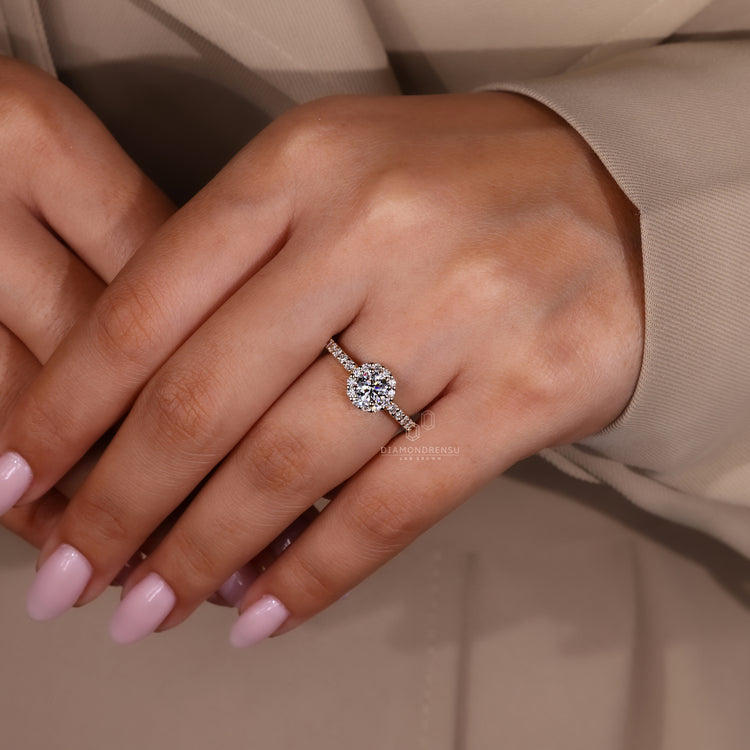 Lab grown diamond ring with round cut stones and pave details.